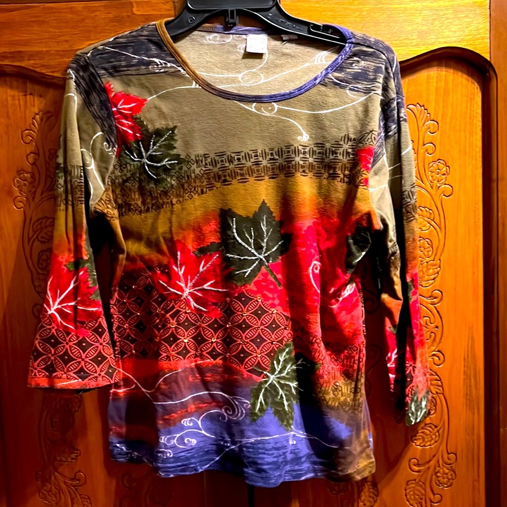 Fall long sleeve T-shirt with beads on the front Beautiful design.